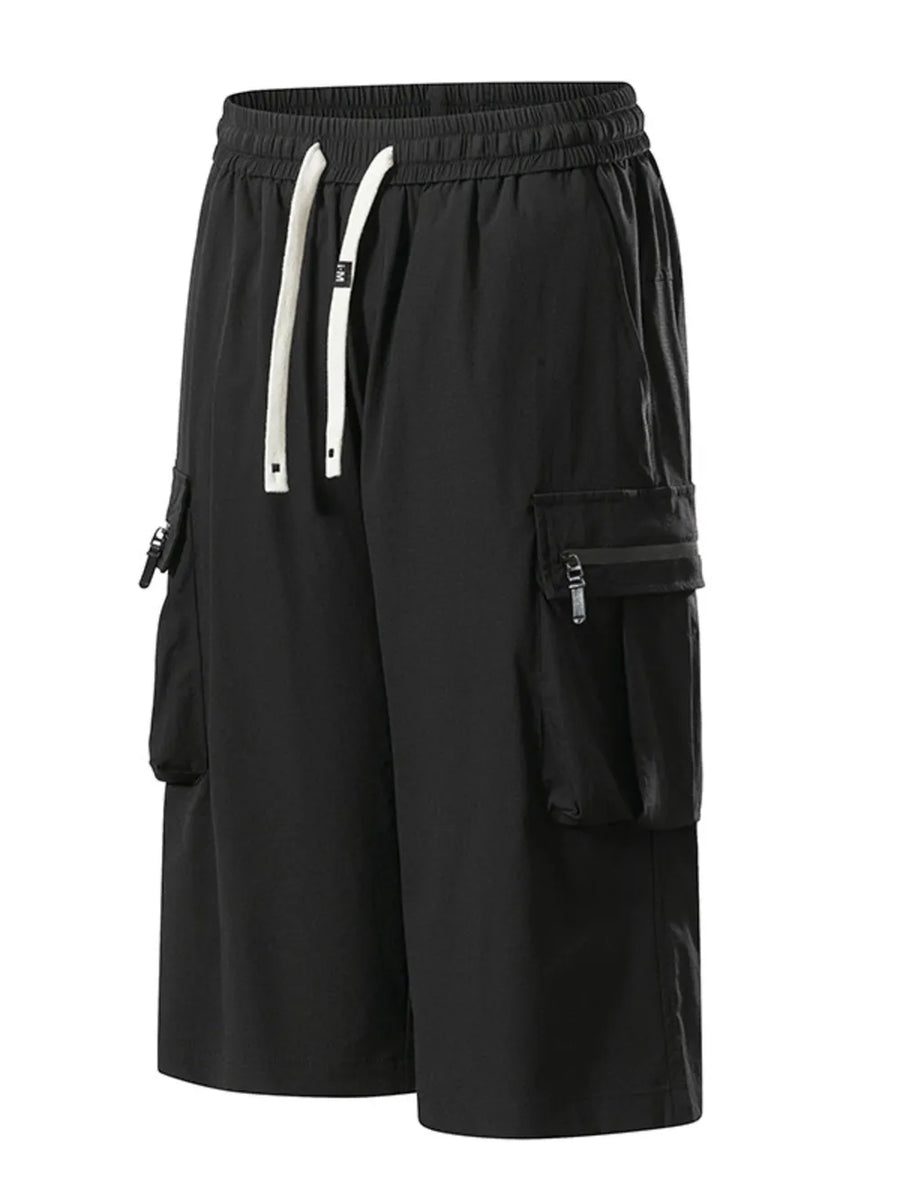 Black cargo shorts with drawstring waist and zippered pockets