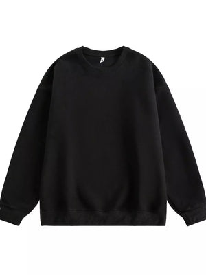 Black oversized crew-neck sweatshirt with ribbed cuffs and hem.