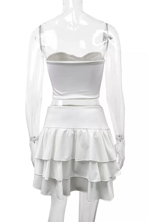 White strapless crop top and tiered ruffle mini skirt set