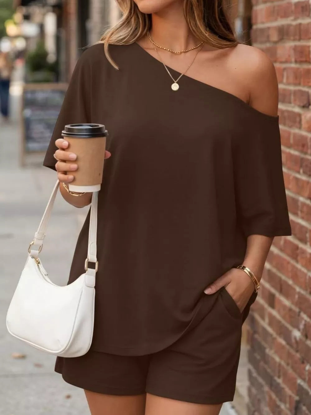 two-piece set in Light Gray with one-shoulder and hip-length