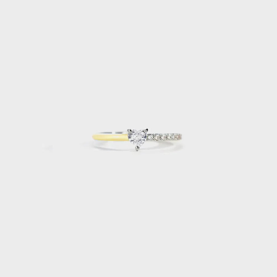 Sterling silver ring with heart-shaped stone and pave band, two-tone band.