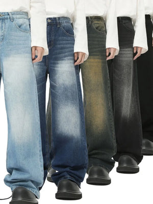 Faded wash balloon leg jeans in light blue, dark gray, and black denim with a relaxed fit.