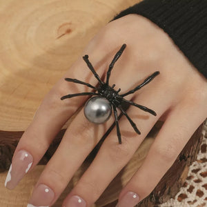ring in black featuring spider motif and jewelry fit