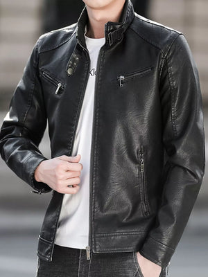 Men's black leather jacket with zip front, stand collar, and zippered pockets.