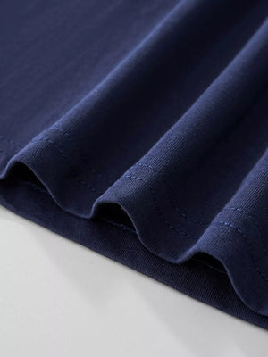 Dark navy cotton tee showing fabric texture and stitching detail.
