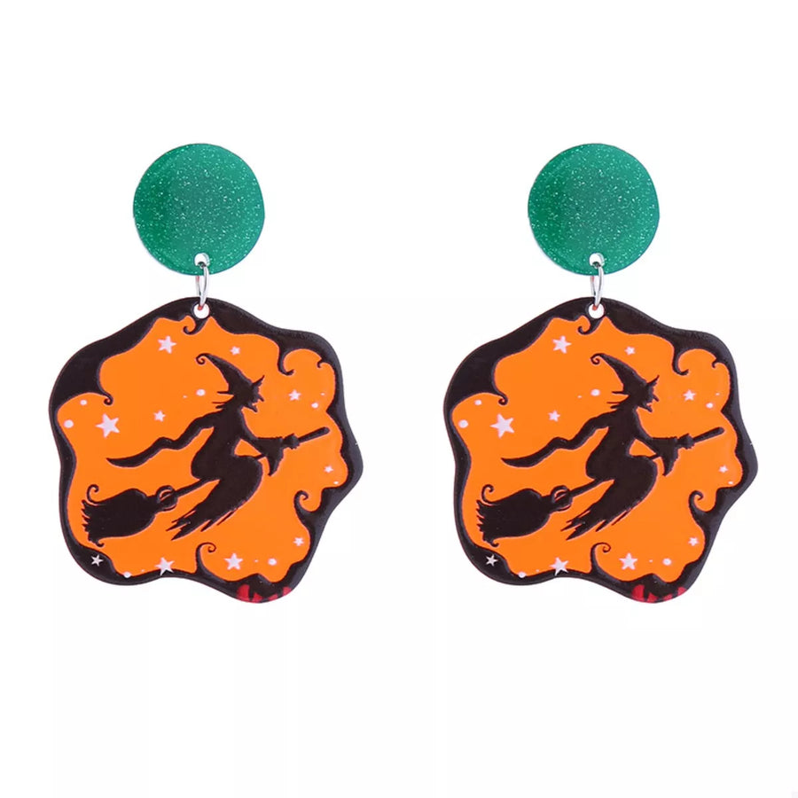 Spooky dangle earrings with green glitter tops and orange witch silhouette design.