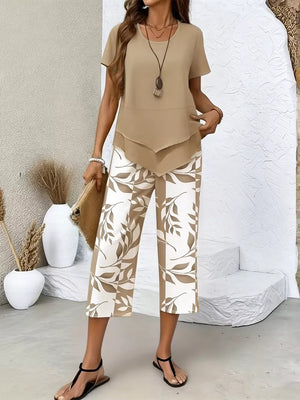 Two-piece set with tan short-sleeve layered top and cropped pants with leaf print