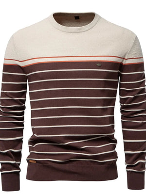 Crewneck sweater with horizontal stripes in brown, ivory, and orange.