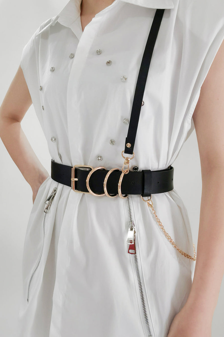 Black PU leather harness belt with gold chain detail and multiple rings