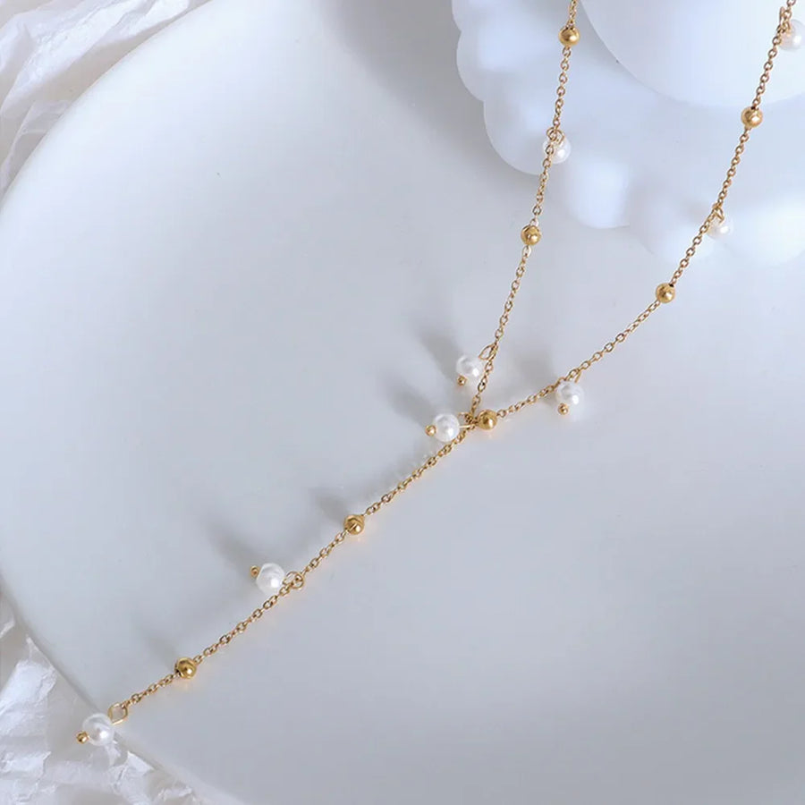 Gold lariat necklace with pearls and gold beads, 18K gold-plated.