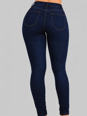 navy blue skinny jeans with full-length and zipper and button
