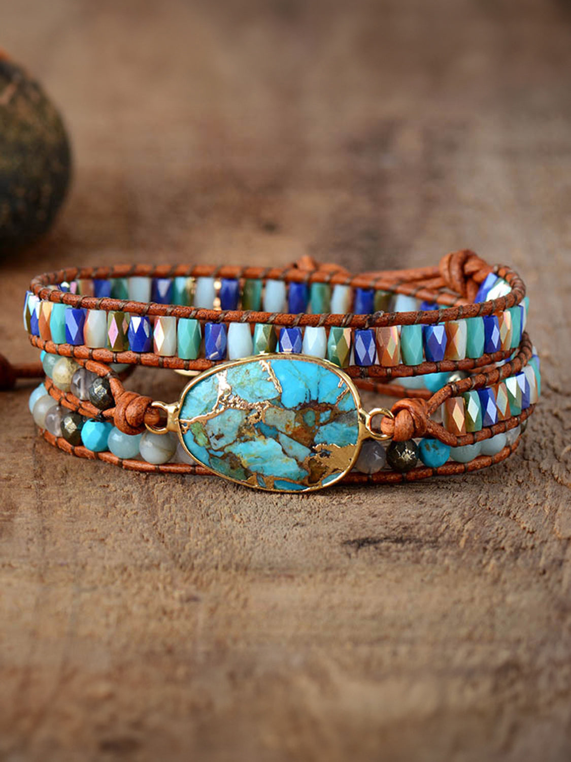 Aqua stone and leather wrap bracelet with beaded accents and gold-tone clasp
