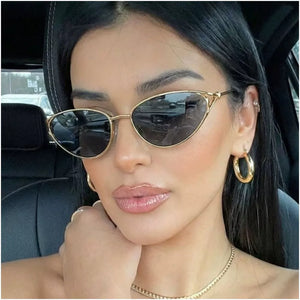 sunglasses in gold featuring UV400 protection and cat-eye fit