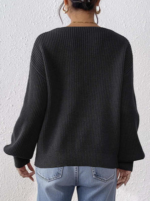 bright orange relaxed pullover sweater with v-neck