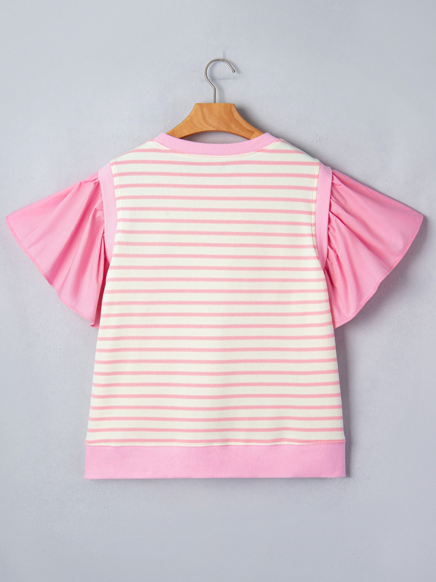Ruffled short-sleeve blouse with pink and white stripes and solid pink sleeves.