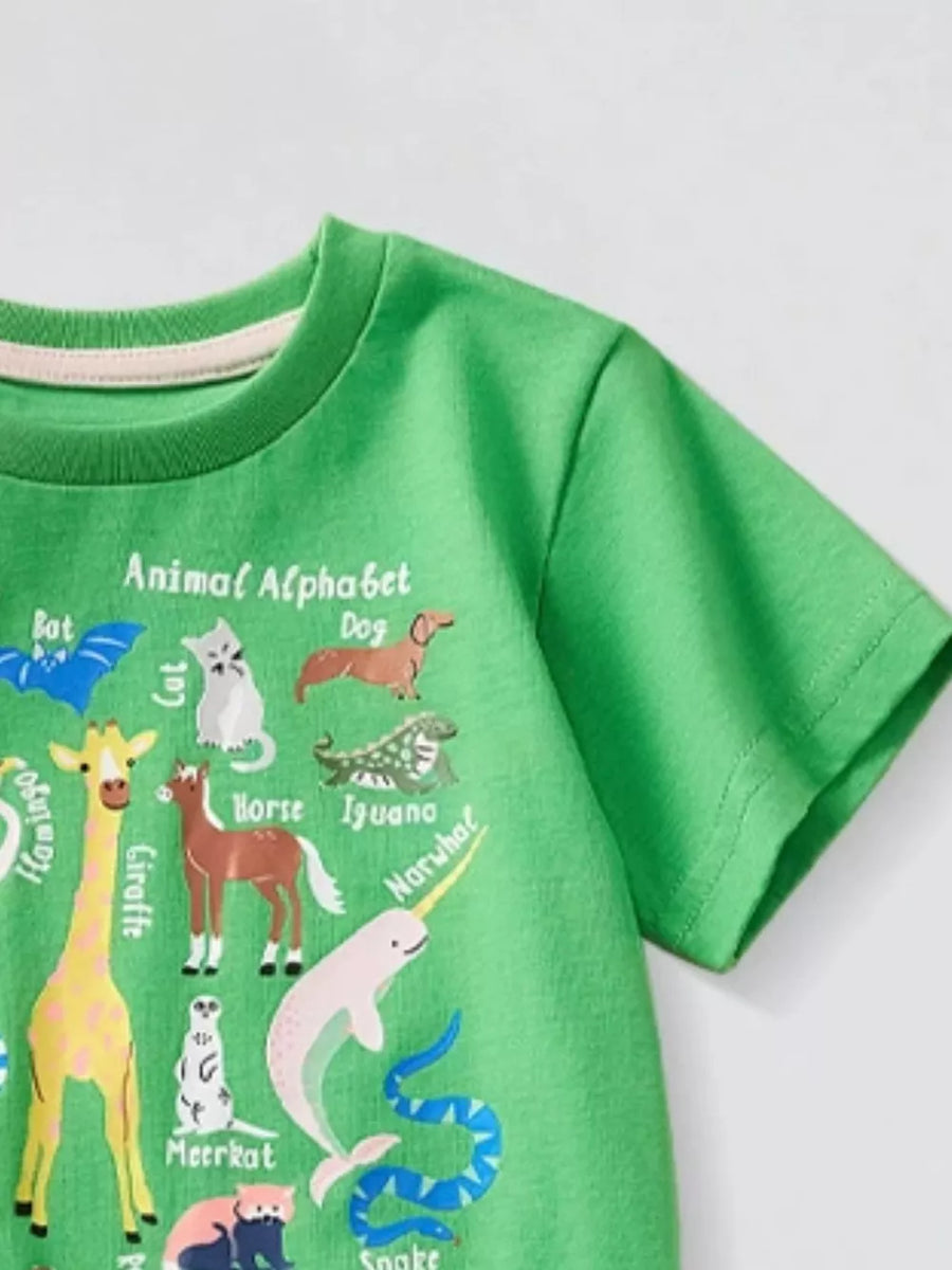 Green t-shirt with Animal Alphabet print featuring giraffe, narwhal, cat, dog, and other animals.