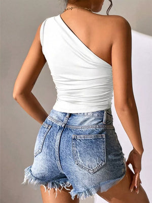 White asymmetrical ruched tank top with one shoulder strap and ruched detailing.