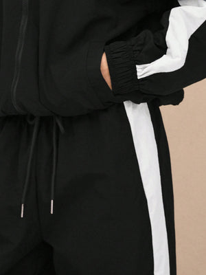 Black tracksuit with elastic waist and long sleeve