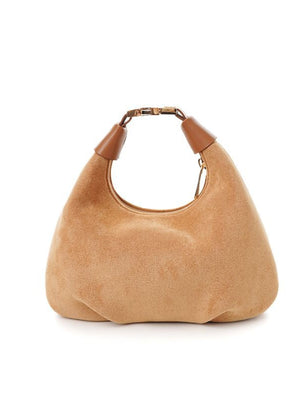 Caramel suede crescent shoulder bag with leather trim and gold hardware.