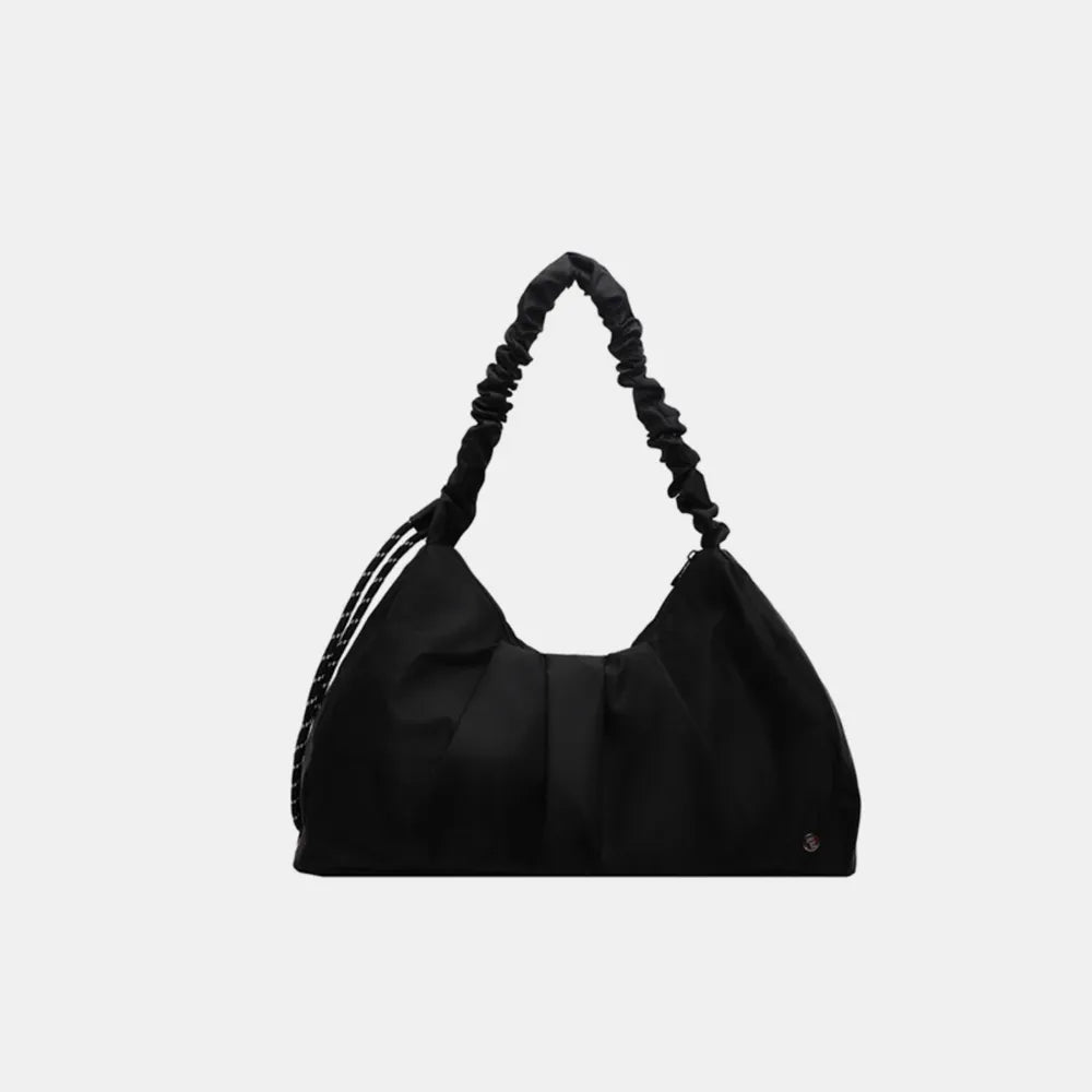 Black ruched handle crescent shoulder bag with braided strap detail