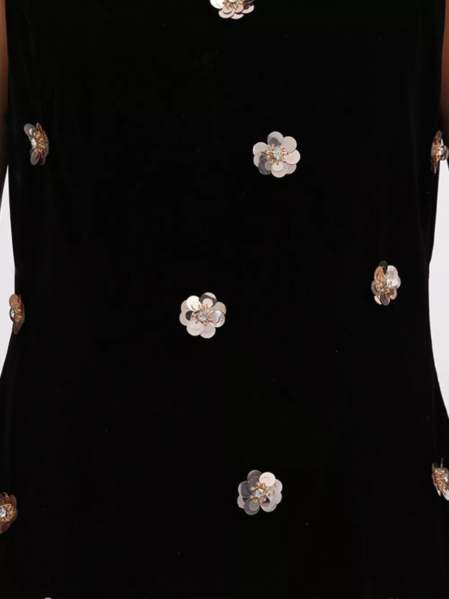 Black velvet sleeveless mini dress with allover rose gold sequin floral embellishments.