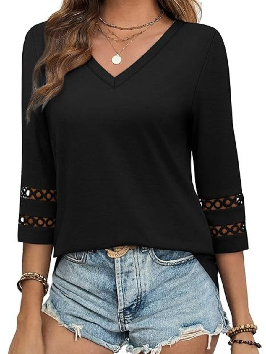 Black 3/4 sleeve t-shirt with V-neck and cutout detail on sleeves.