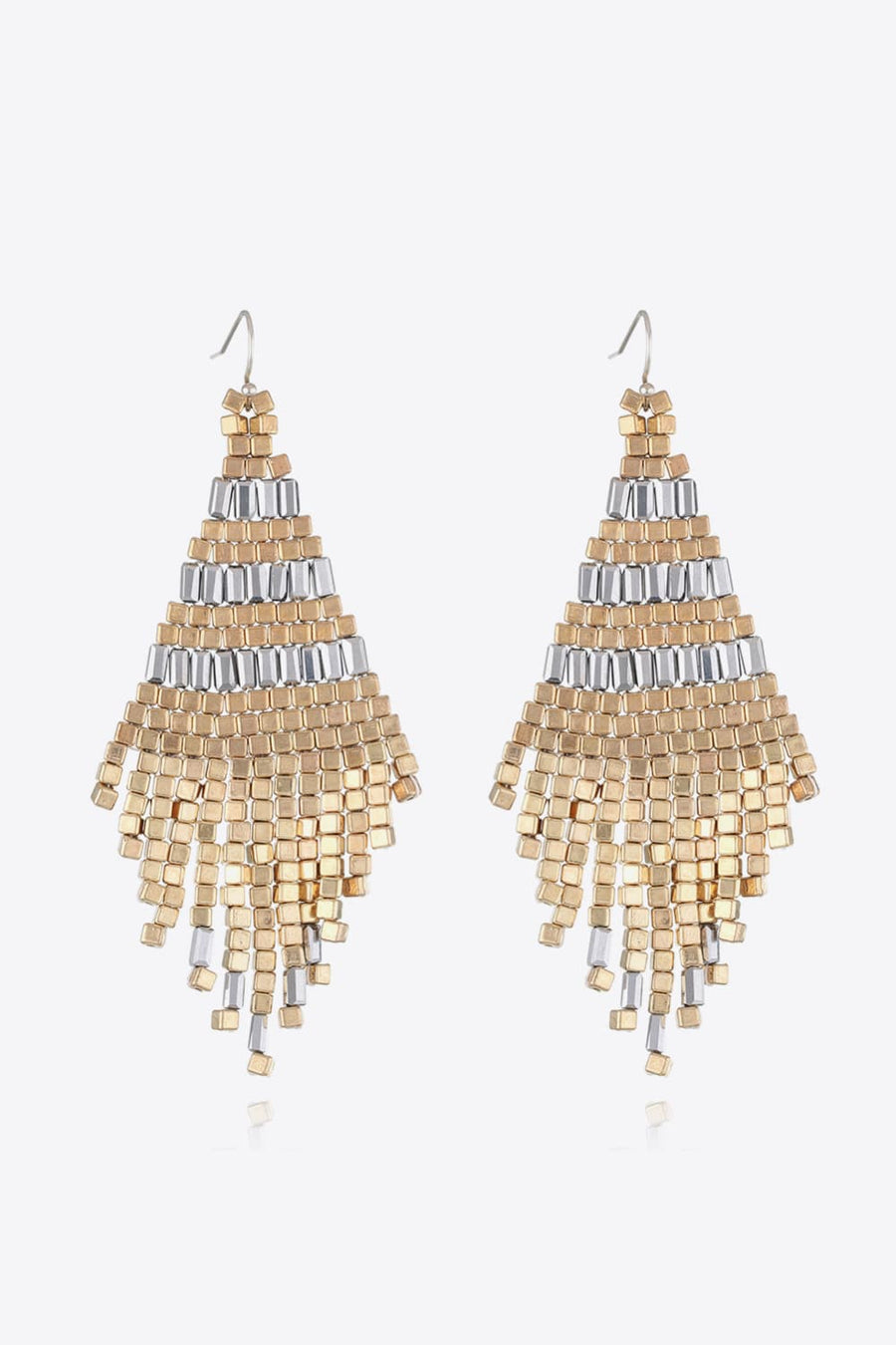 Geometric beaded fringe earrings in gold and silver with cascading bead detail.