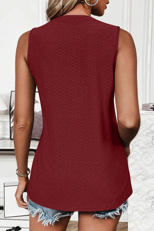 Burgundy textured sleeveless shell top with allover geometric pattern