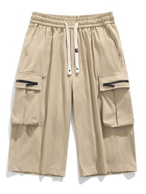 Khaki cargo shorts with elastic waist, drawstring, and zippered pockets.