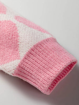 Charming Heart Pattern Knit Sweater in blush pink acrylic with ribbed cuffs.