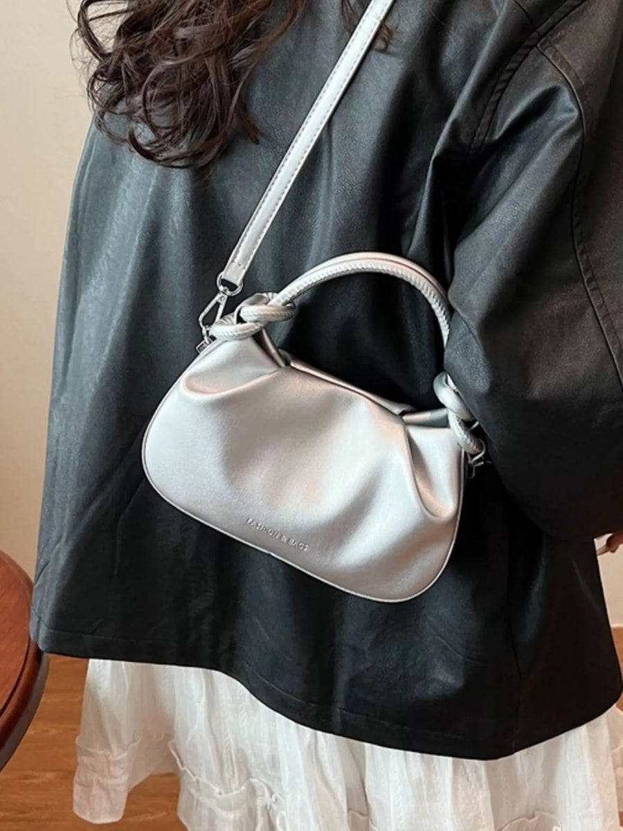 Mini ruched crossbody bag in gray with knot detail on handle and strap