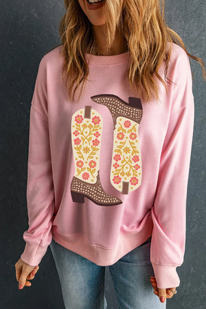 Blush pink crewneck sweatshirt with a floral boot graphic.