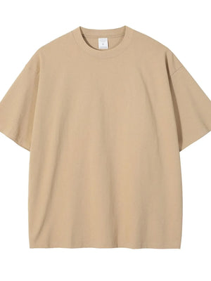 Oversized crewneck tee in beige, relaxed fit, short sleeves, basic casual style.