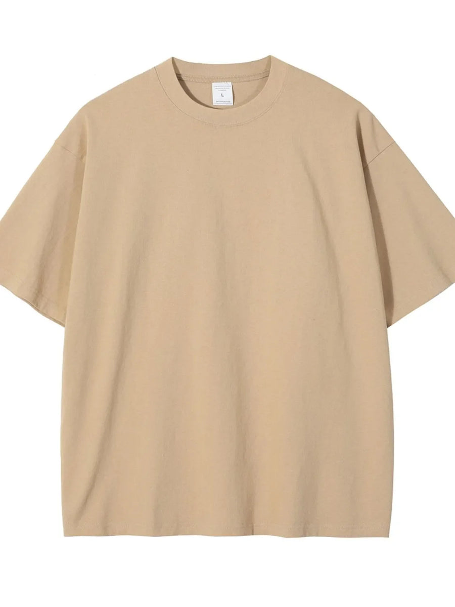 Oversized crewneck tee in beige, relaxed fit, short sleeves, basic casual style.