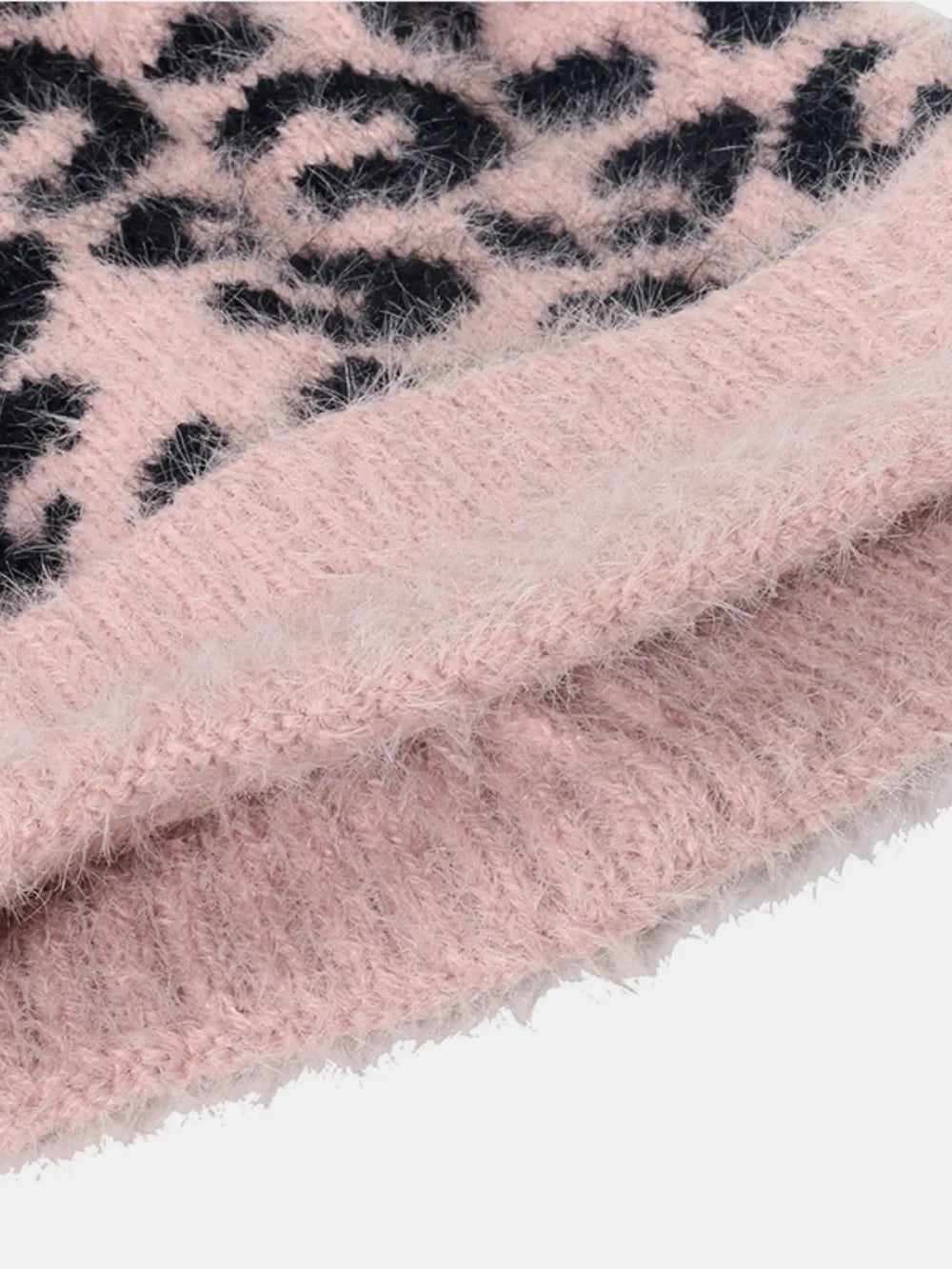 Blush pink acrylic leopard print knit beanie with fuzzy lining