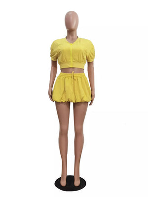 Yellow zip-up crop top with puff sleeves and drawstring shorts set