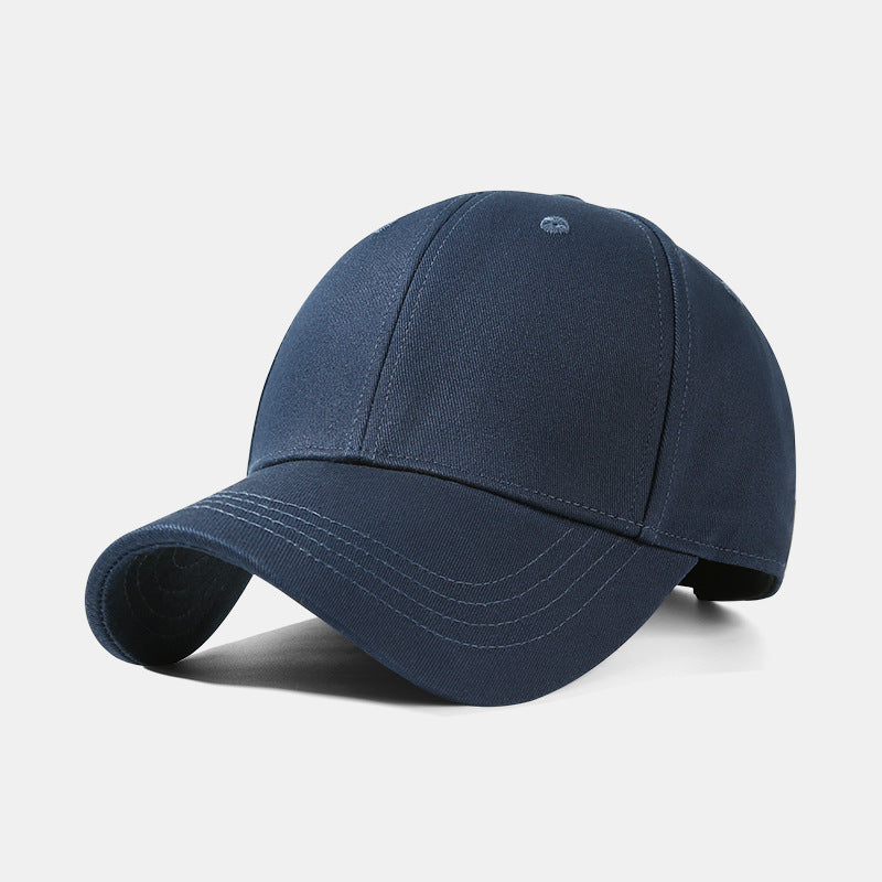 Navy blue cotton baseball cap with adjustable strap and 6-panel construction.