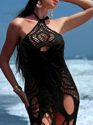 Black crochet halter dress with cutouts and a sheer design