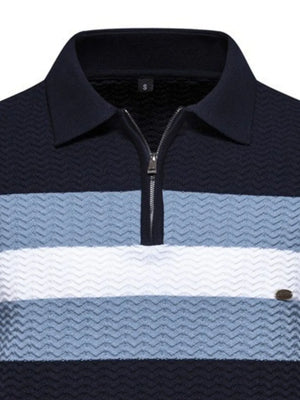Chevron stripe zip polo in dark navy, light blue, and white with textured fabric.
