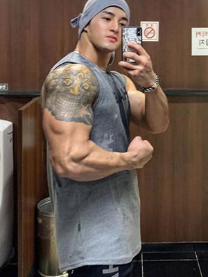 Gray reversed logo muscle tank top with a crew neck and sleeveless design.