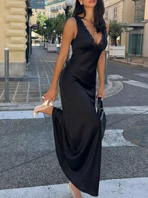Black lace-trimmed sleeveless maxi gown with a V-neckline and cinched waist.