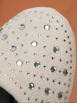 Beige suede ballet flats with allover crystal embellishments.
