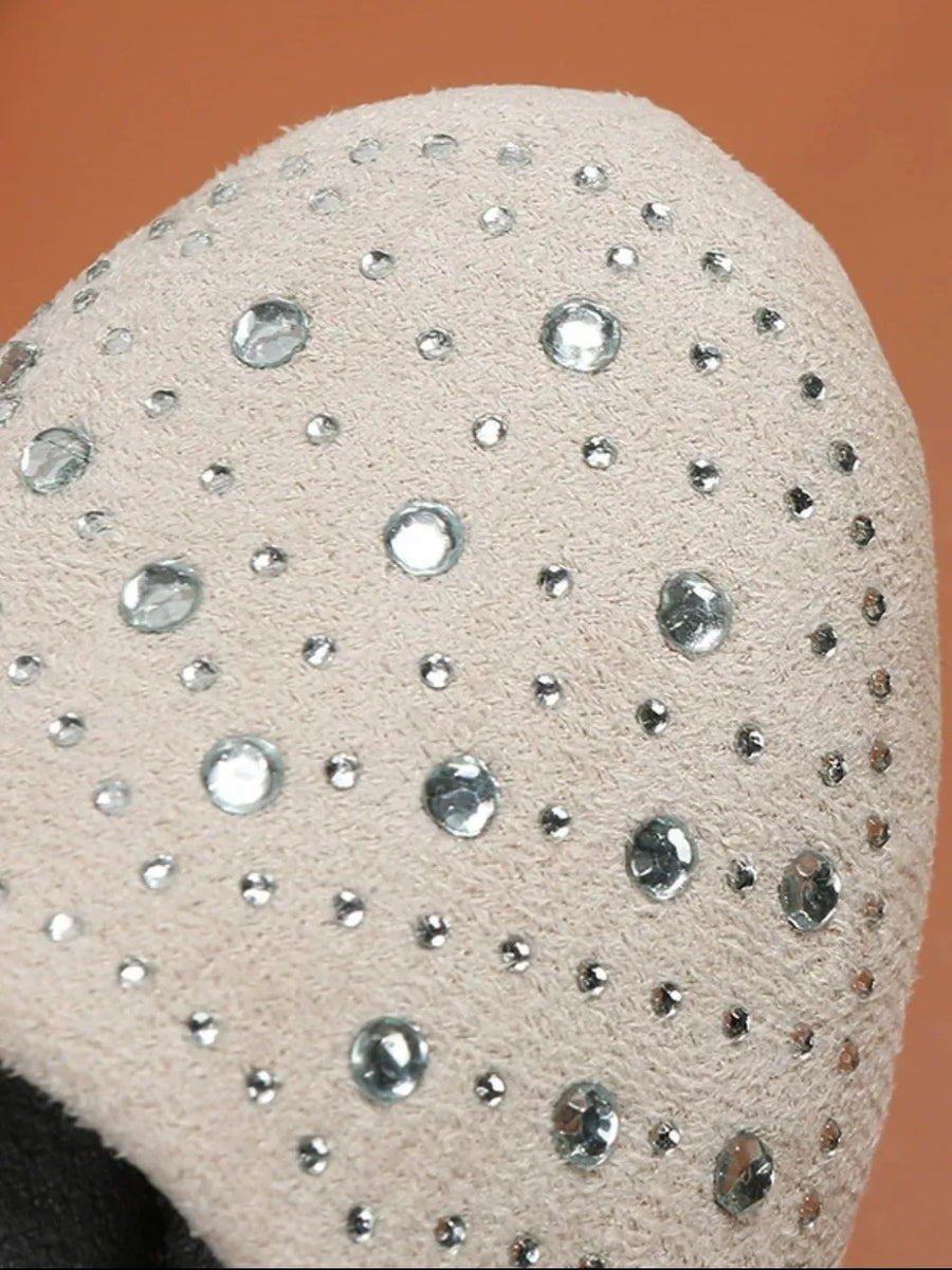 Beige suede ballet flats with allover crystal embellishments.