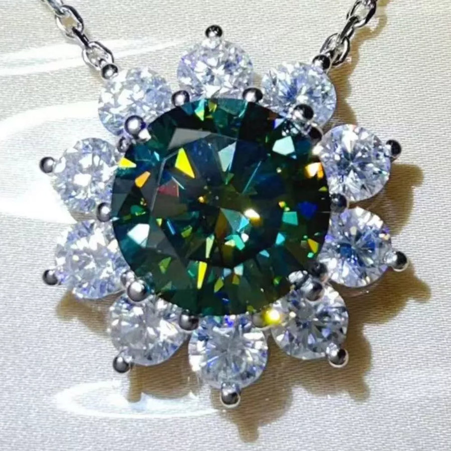 silver necklace featuring moissanite stones and floral