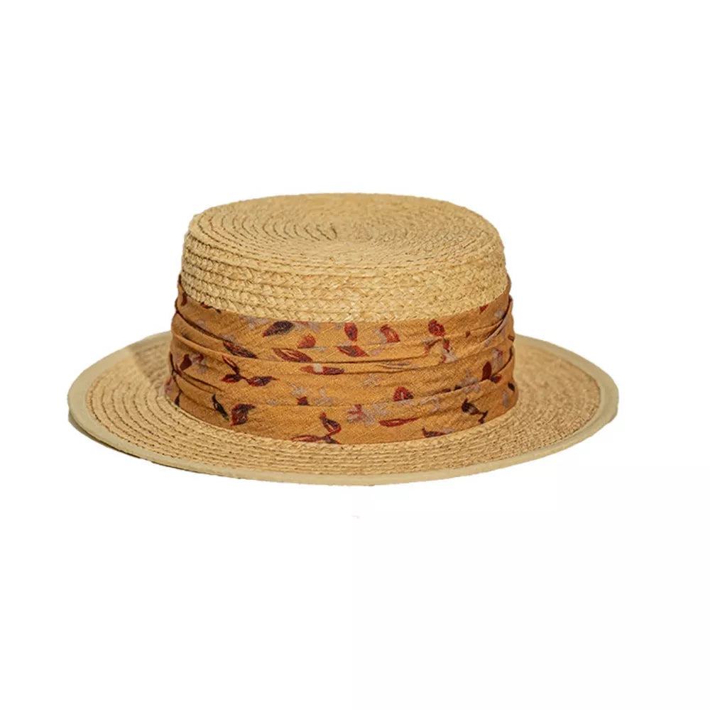 Chic straw boater hat with floral band and yellow ribbon detail