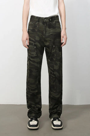 Utility camo carpenter jeans in black with multiple cargo pockets.