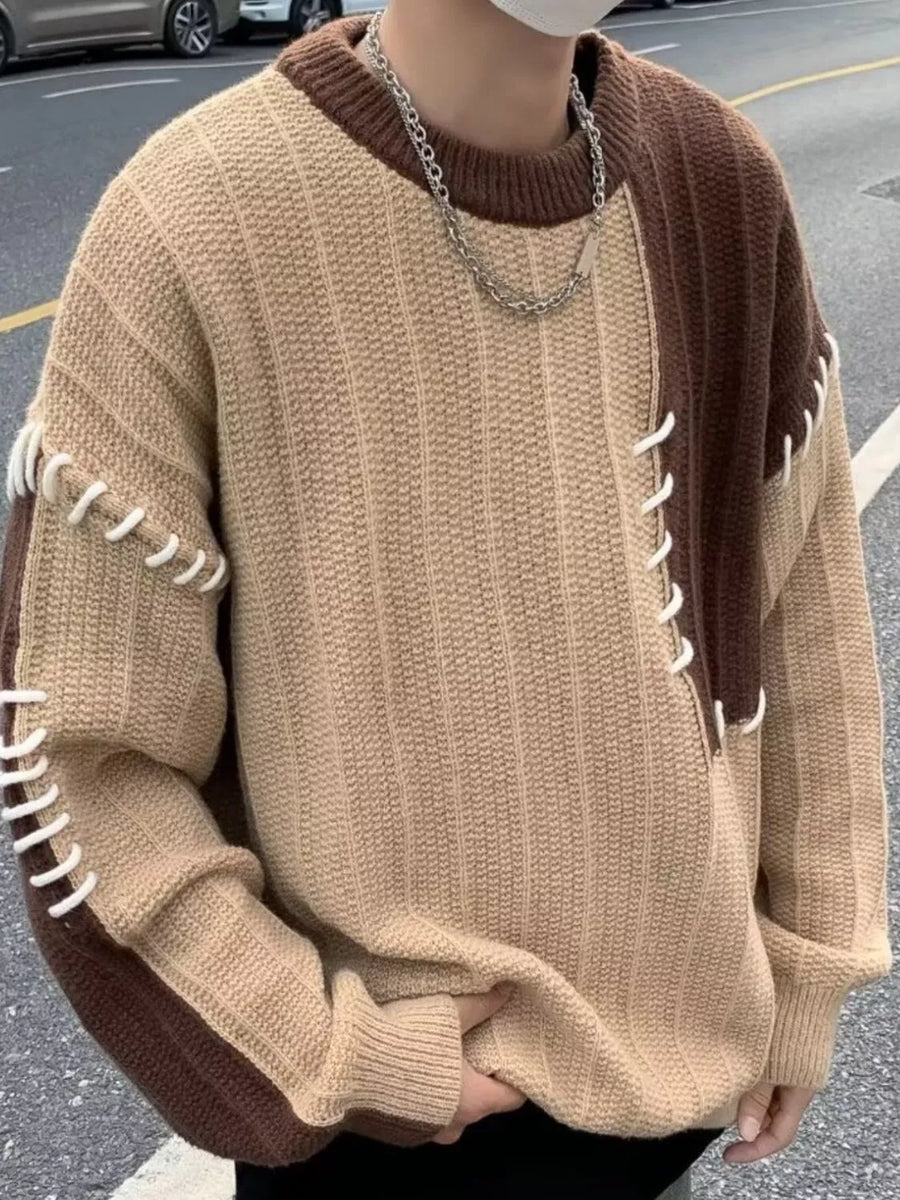 Oversized beige and brown color block sweater with white contrast stitching detail.