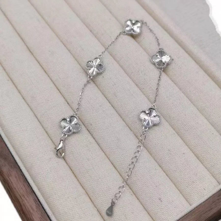 bracelet featuring four-leaf clover in silver with 925 sterling silver Care instructions: Avoid wearing during exercise, as