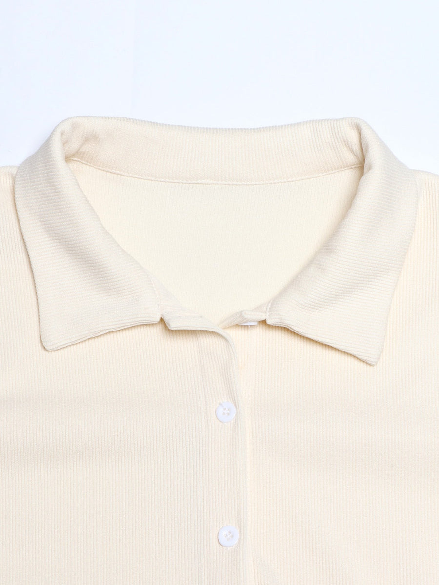 Cream ribbed knit lounge set top with collar and buttons.
