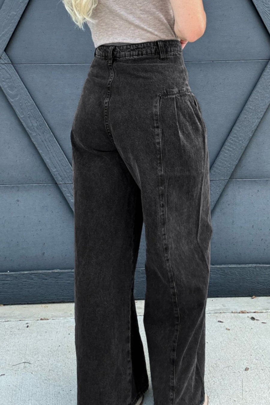 Black pleated front palazzo jeans with a wide leg